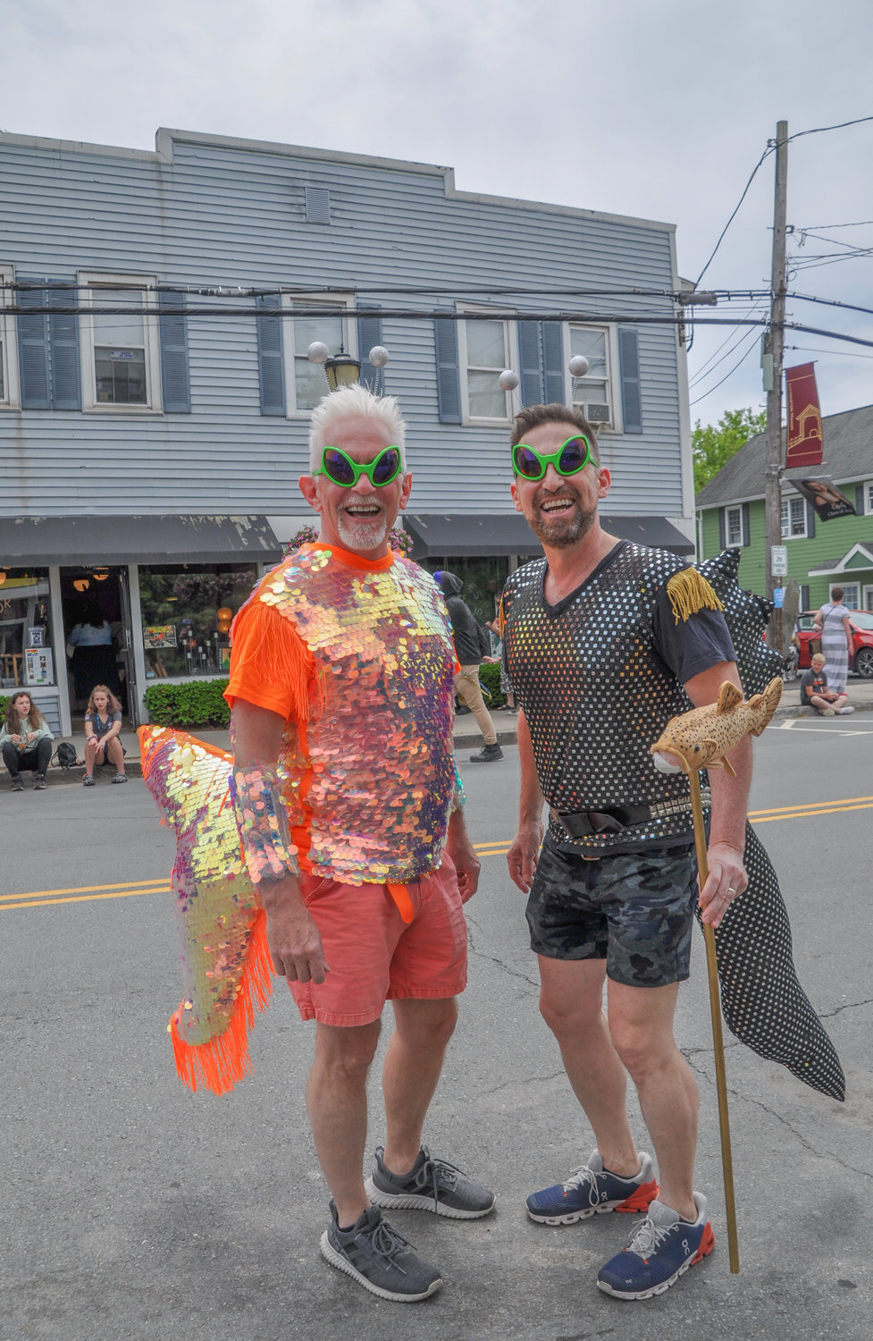 Trout Parade ambassadors Steven and Gerard are fixtures along Main Street each year, welcoming locals and visitors prior to the floats swimming their way through town in Livingston Manor, NY.